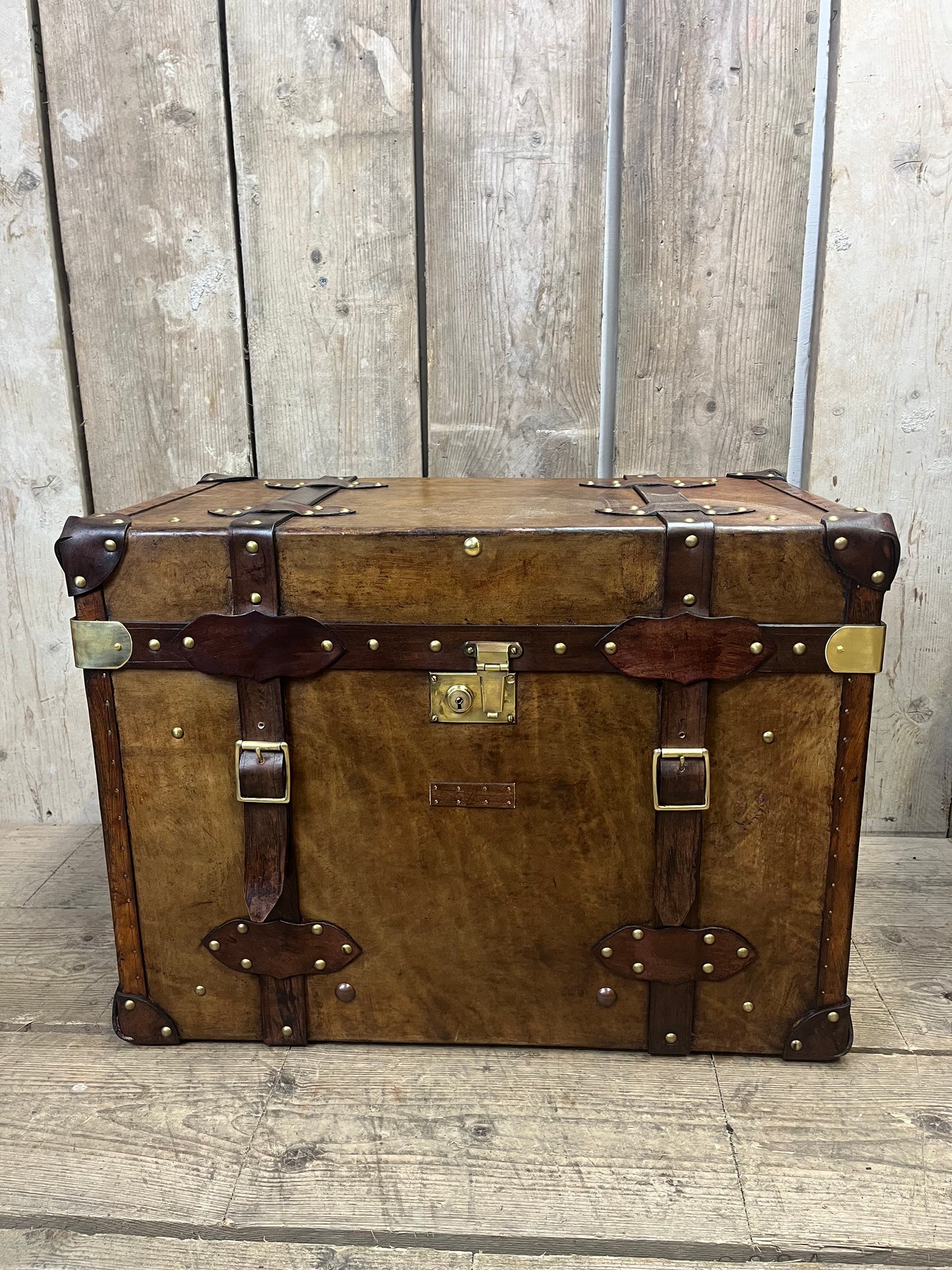 Pair Of Belted Leather Trunks