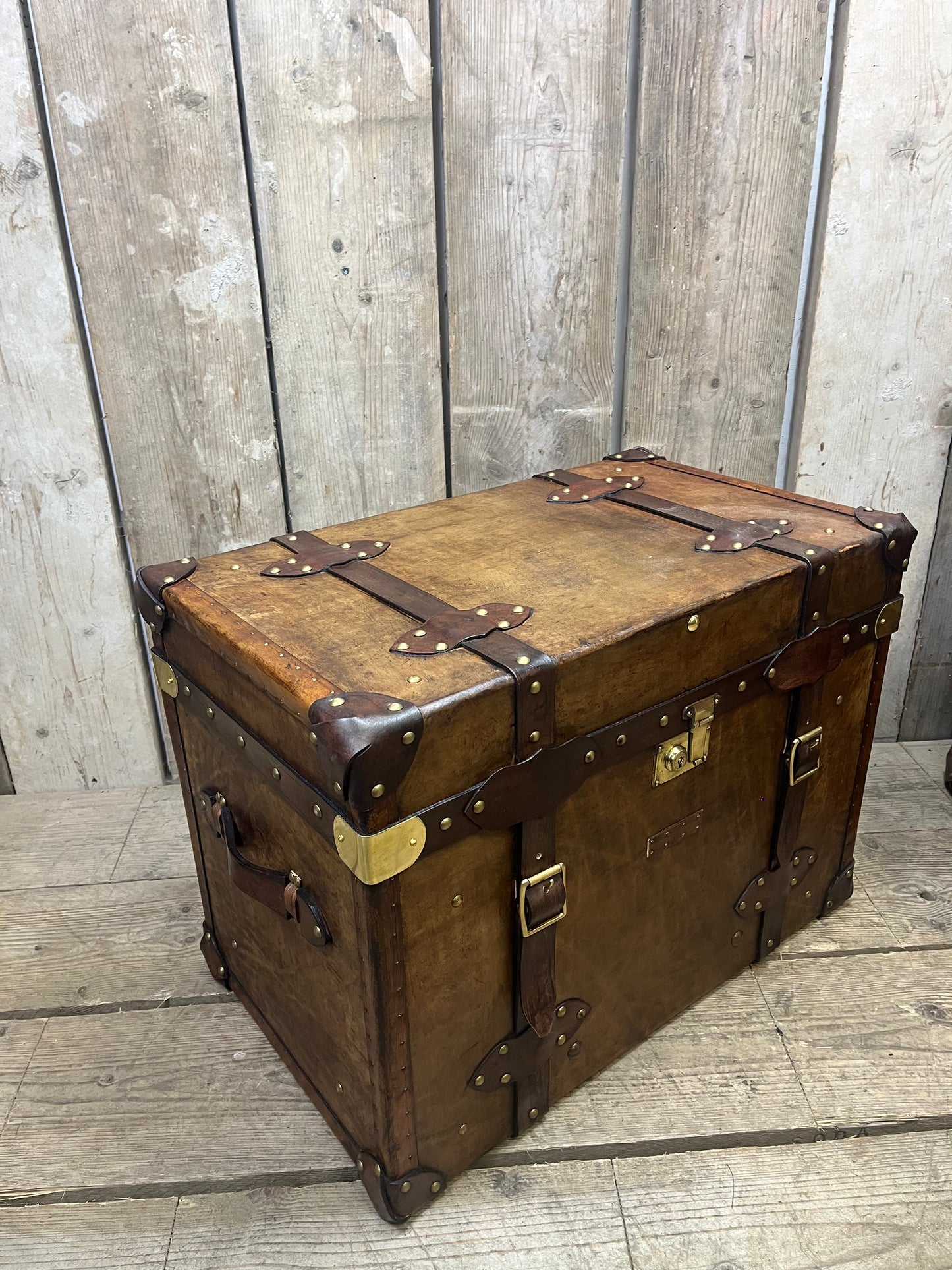 Pair Of Belted Leather Trunks