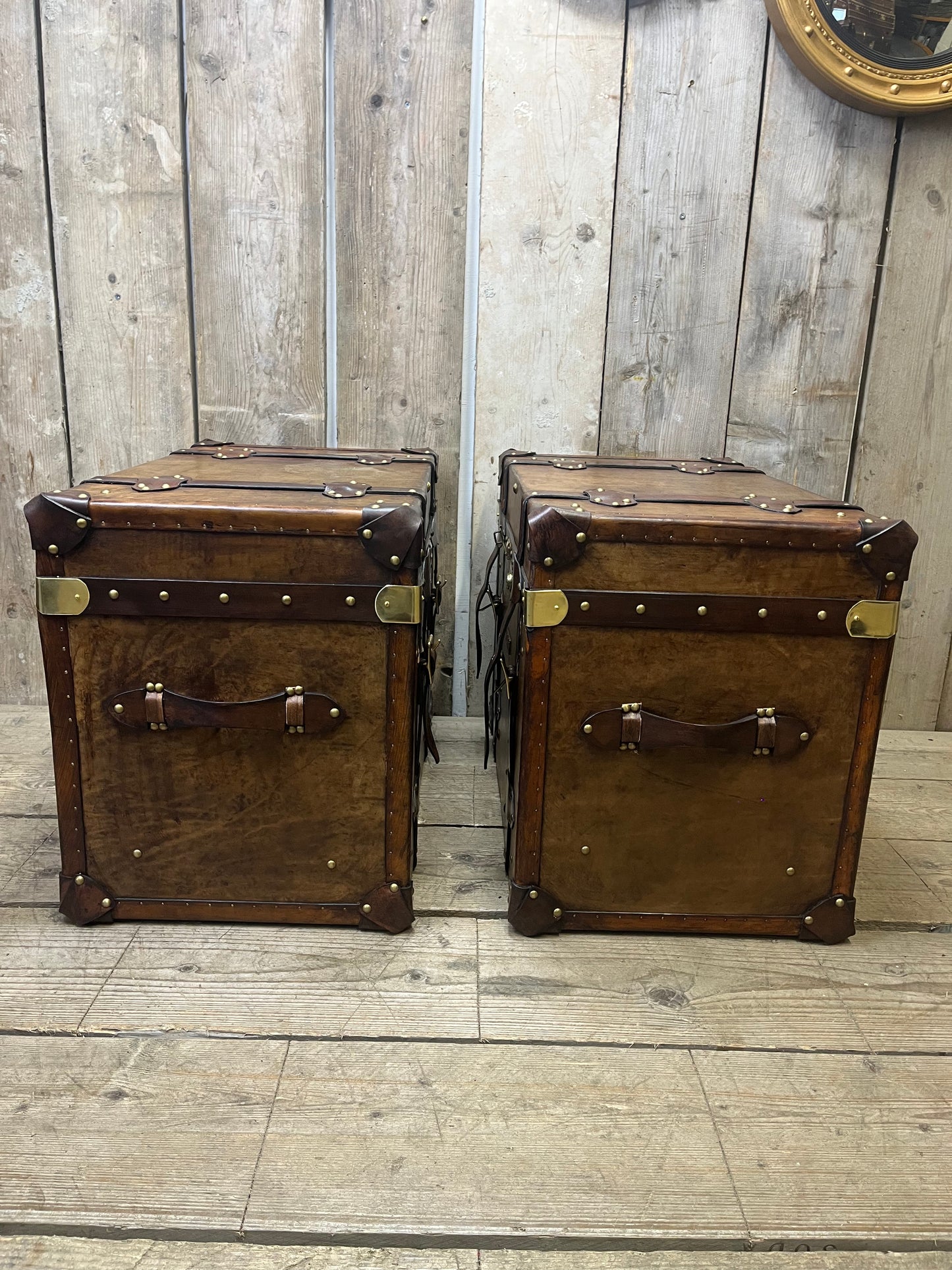 Pair Of Belted Leather Trunks