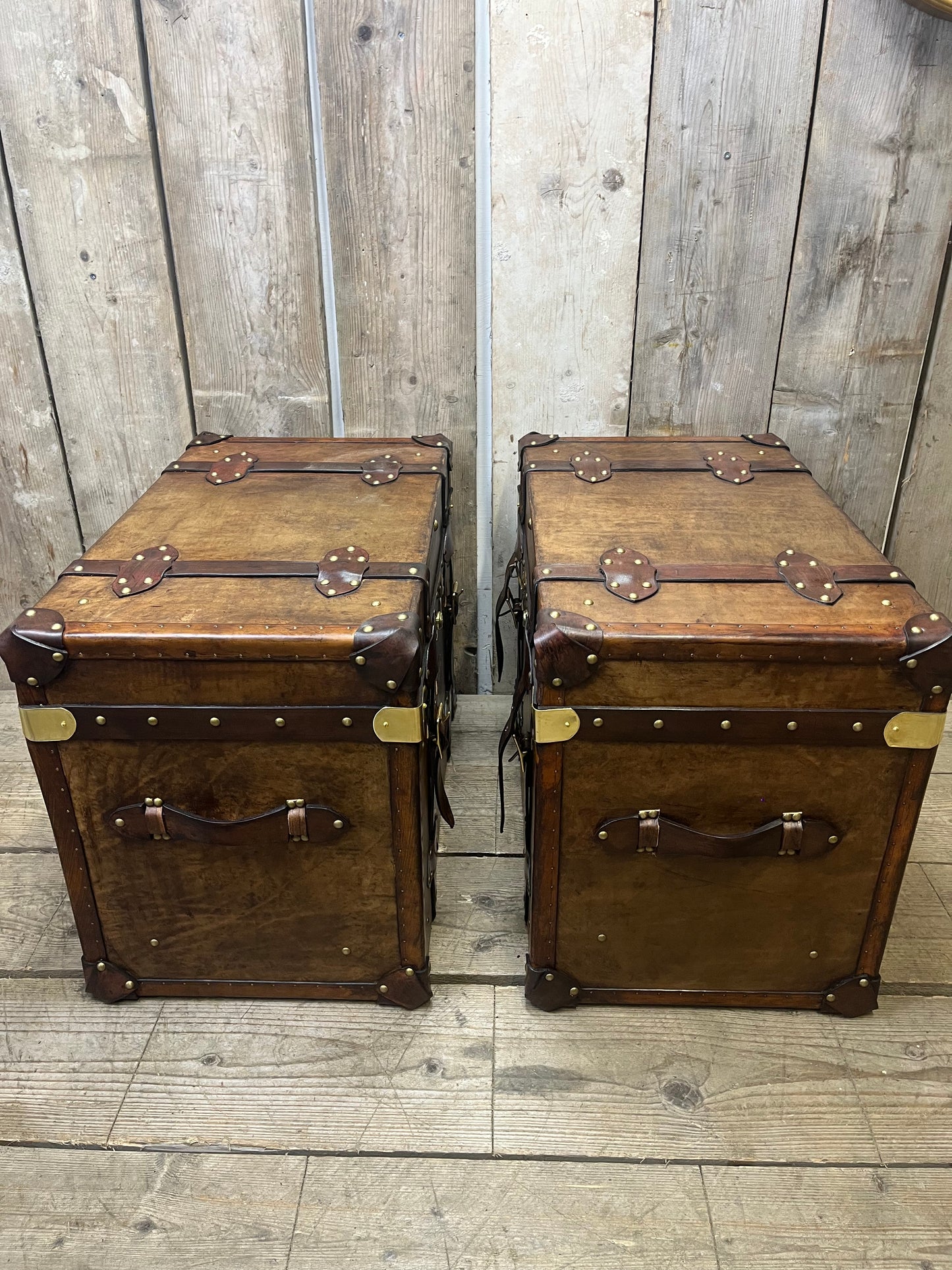 Pair Of Belted Leather Trunks